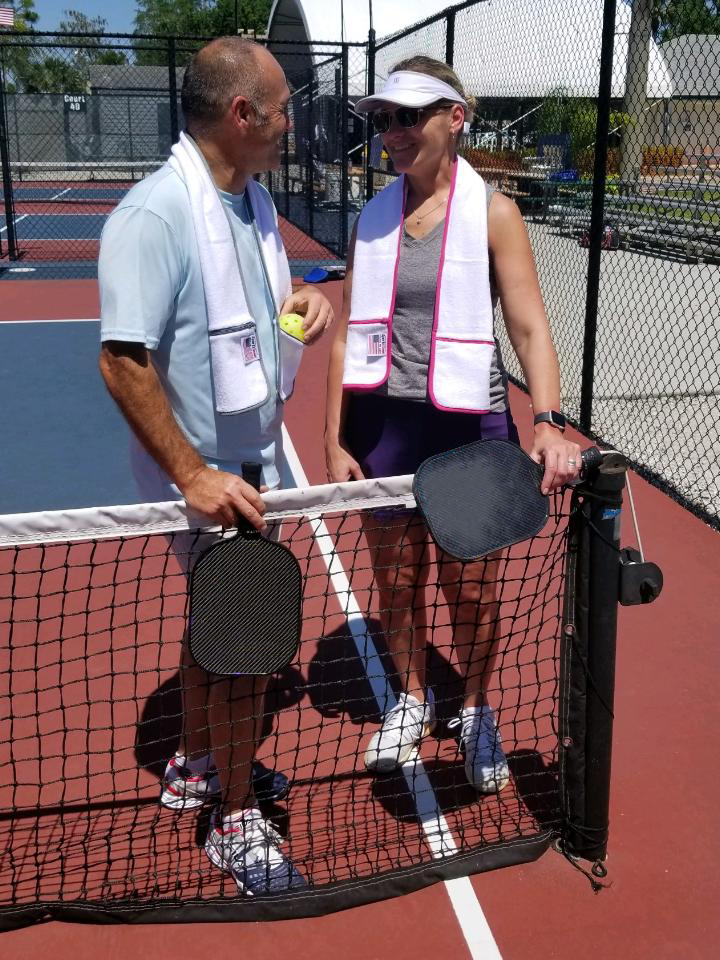 pickleball players man and woman on court